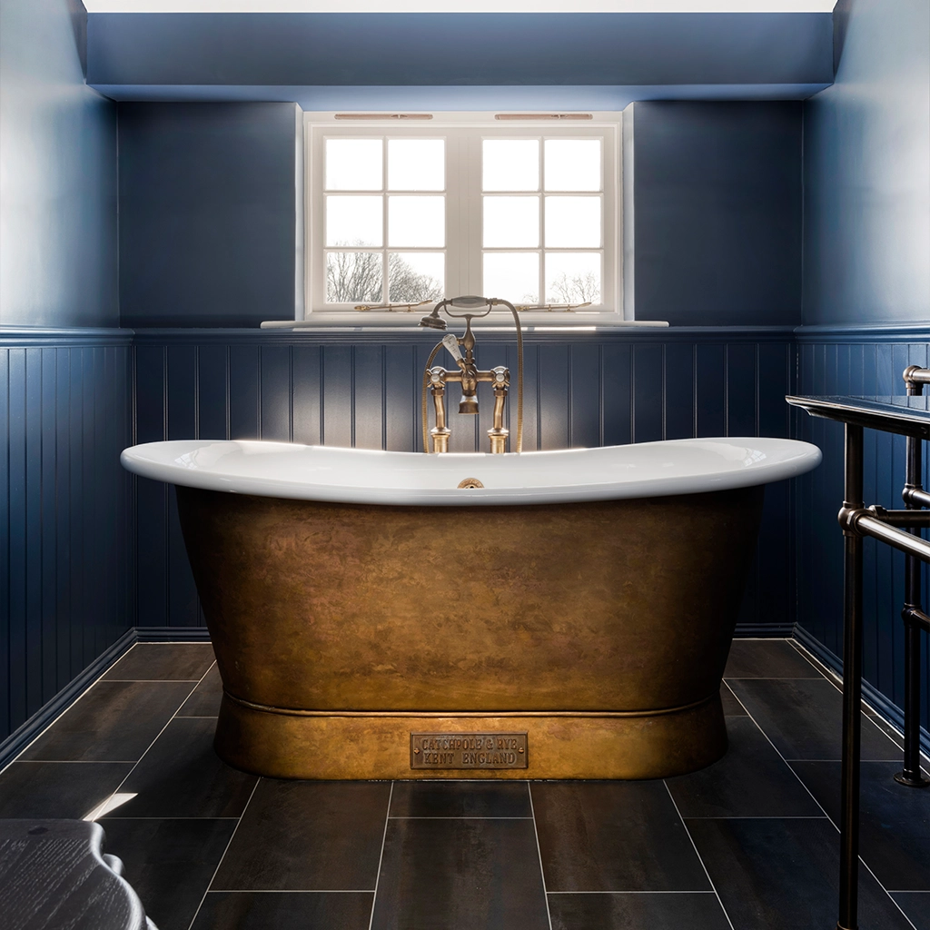 Freestanding Brass Bath Traditional roll top with bath filler on standpipes