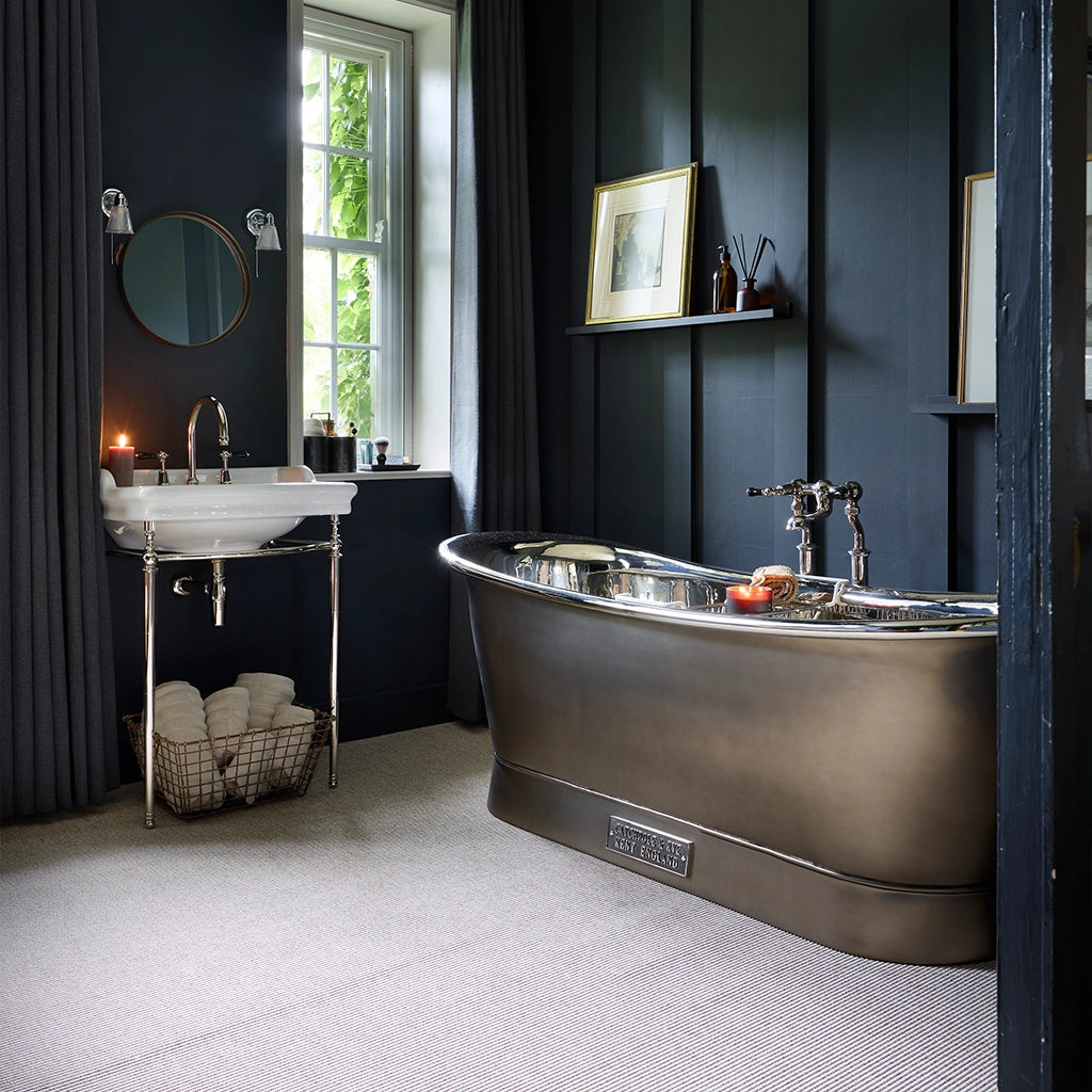 Freestanding Nickel Bath Traditional roll top with bath filler on standpipes
