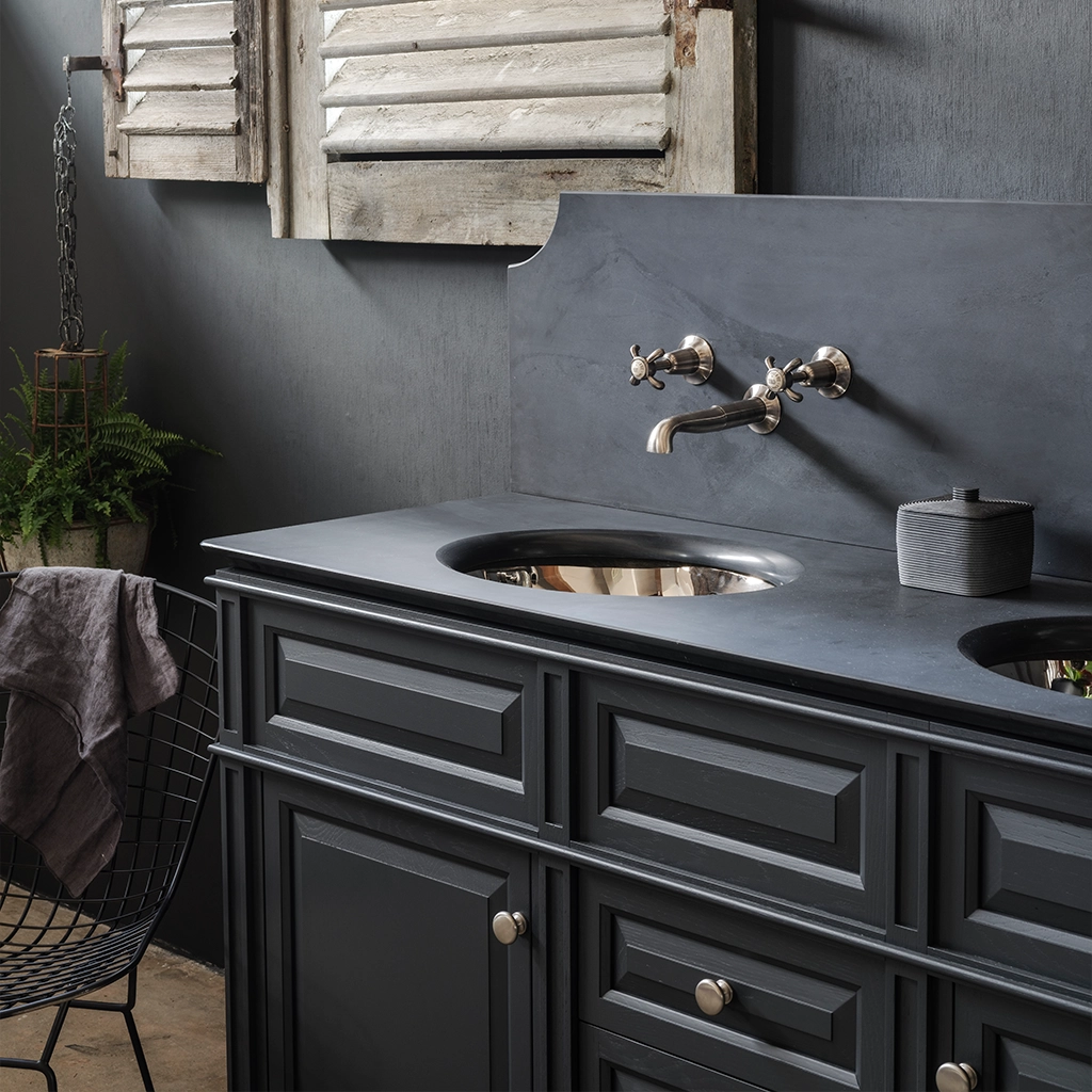 Double wooden vanity unit with amble bathroom storage and marble splashback